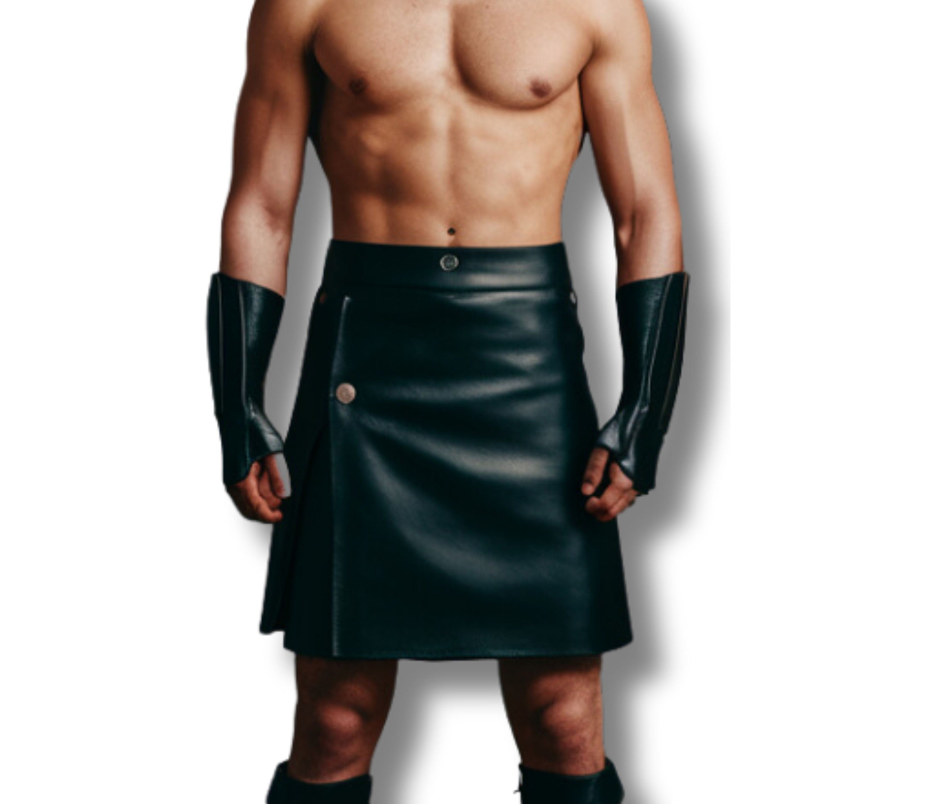 Close-up front view of a mens gladiator costume showcasing the handcrafted black leather kilt outfit. Detailed stitching, rivets, and the sleek finish highlight durability and warrior style. This leather gladiator costume can serve as a Roman gladiator costume, Spartan gladiator costume, or medieval costume, ideal for cosplay outfit, kilt warrior costume, or gladiator Halloween costume. - Creed Leather